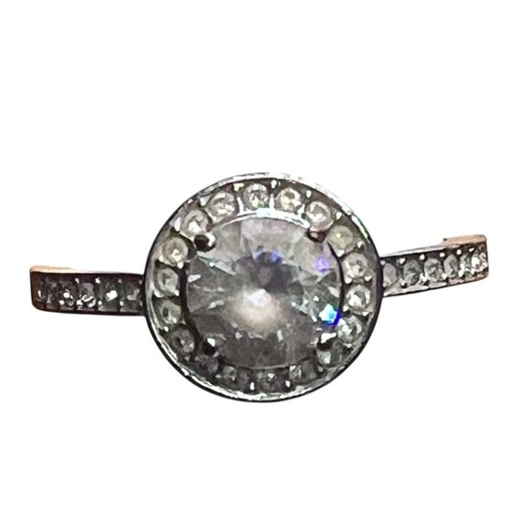 Size 7 ring, stamped 55, clear stones silver color band - Picture 7 of 11